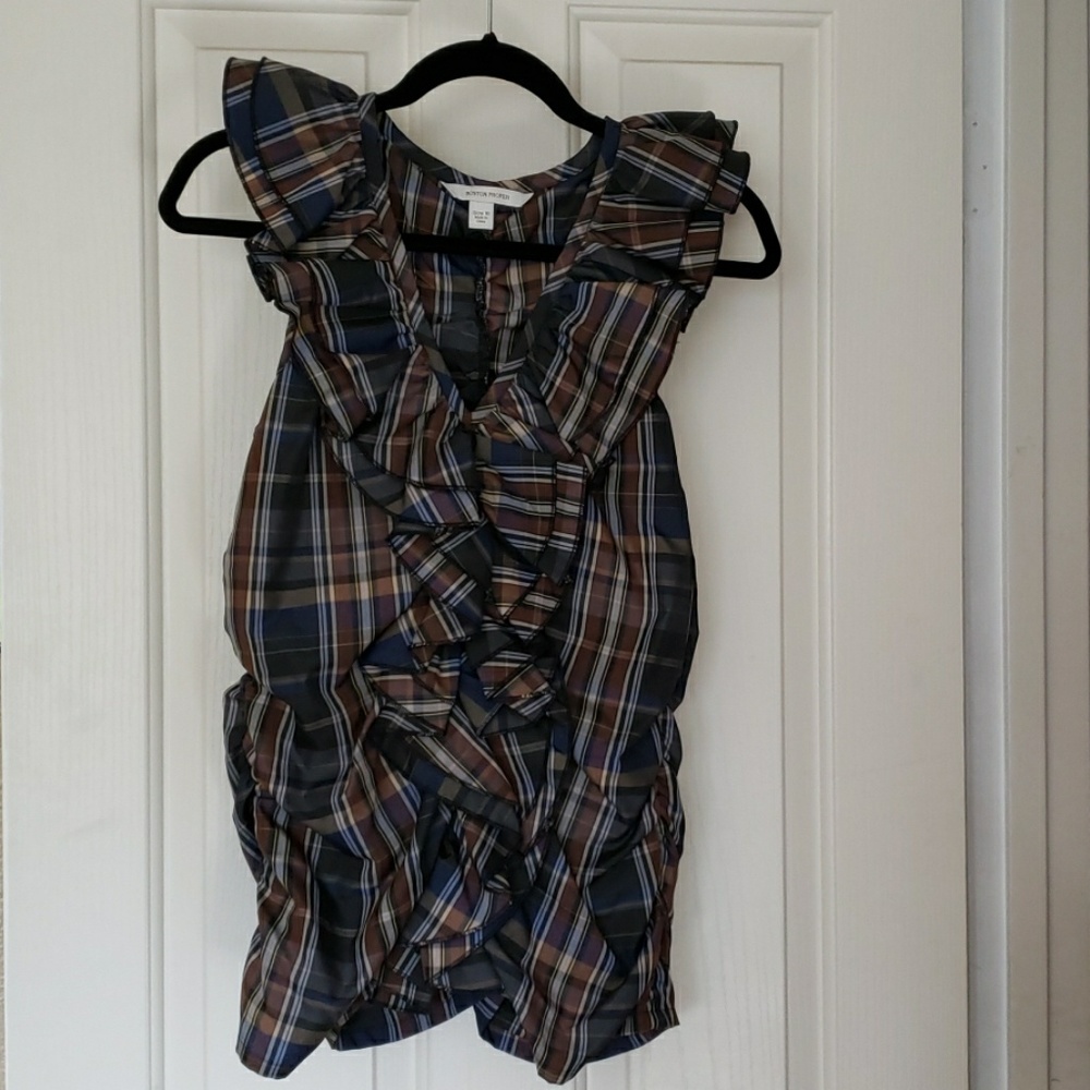 Ruffled,  gathered on the sides & back